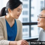 장애인재활상담사와 장애인 지원 제도 - A compassionate Japanese rehabilitation specialist attentively listening and discussing with a middl...